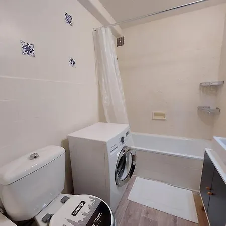 En Rez-de-jardin Lejlighed *